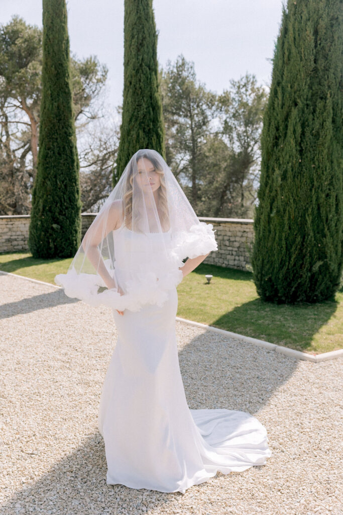 Black and white portrait of a bride wearing a veil for a destination wedding in Provence, south of France