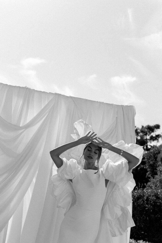 Elegant bride portrait in a white wedding dress at a luxury venue in Provence, south of France