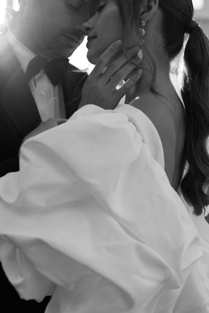 Intimate close-up of a wedding couple kissing in black and white at a destination wedding in Provence, south of France