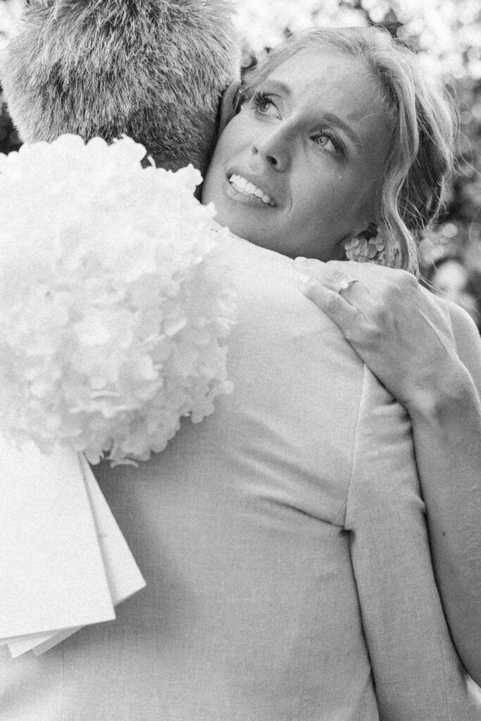 Black and white photo of a guest moved to tears during the wedding ceremony in Provence, south of France