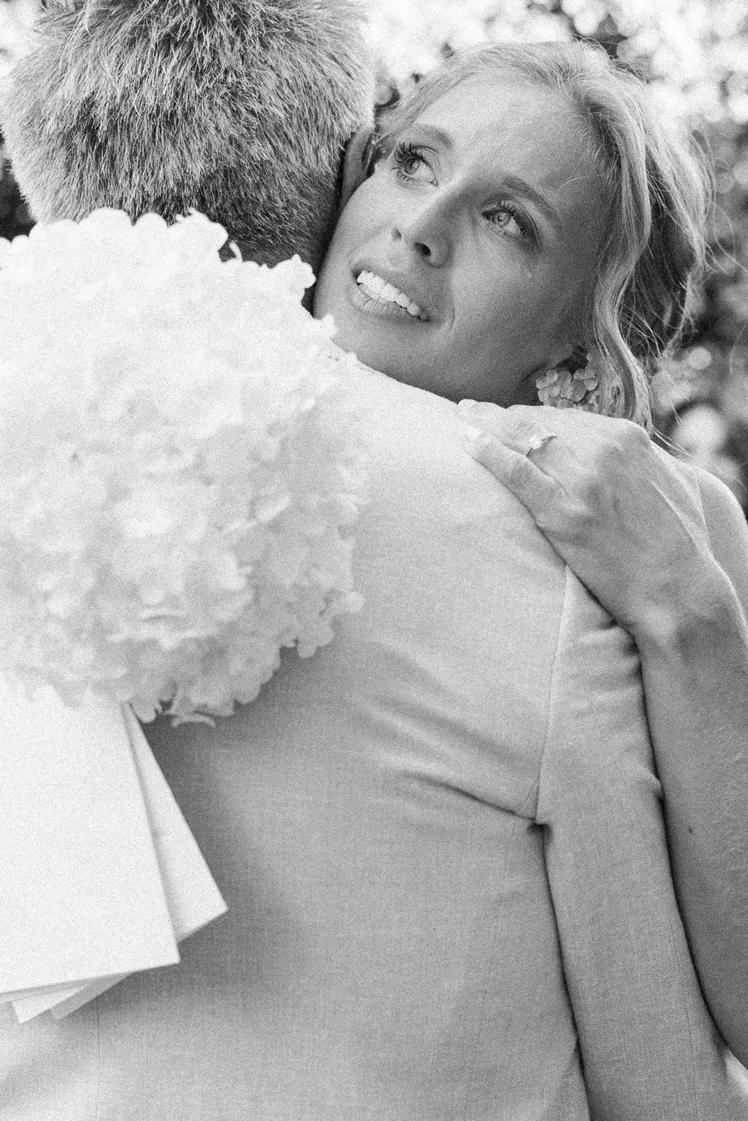 Black and white photo of a guest moved to tears during the wedding ceremony in Provence, south of France